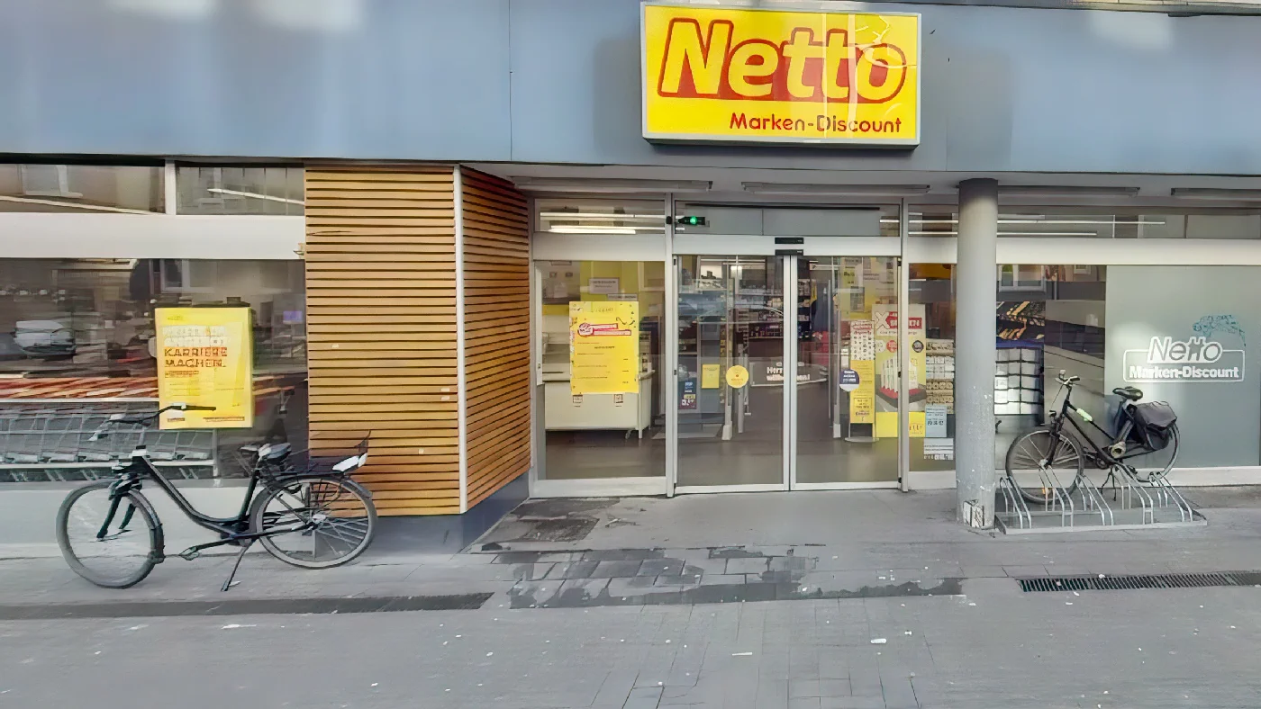 Netto Marken-Discount gelbes Schild Fahrrad Lebensmittel Discounter günstige Preise große Produktauswahl Aldi Lidl Supermarkt Köln Sülz
